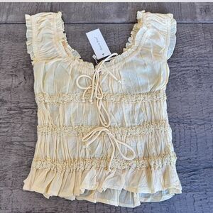 Sim & Sam Butter Yellow Tie Front Ruffle Lace Top
Small NWT Cottagecore